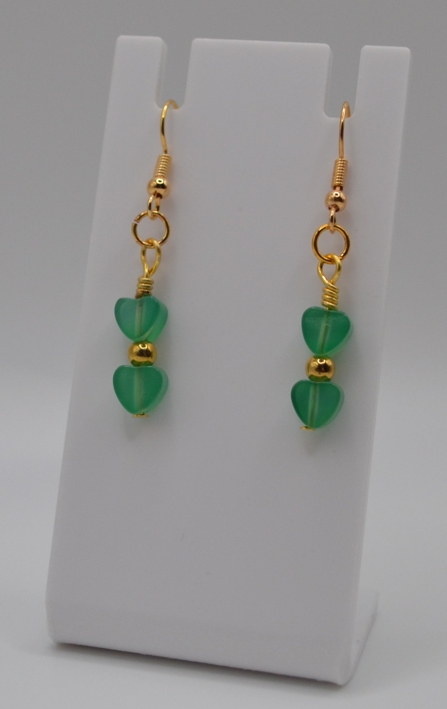 Green glass heart earrings