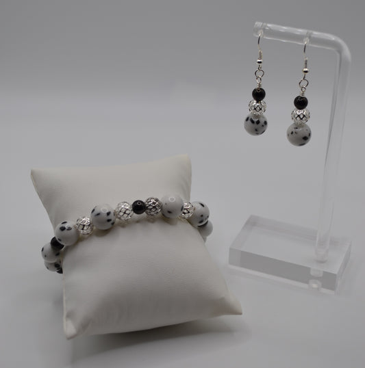 Dalmatian cage and black bead earrings