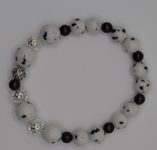 Dalmatian cage and black bead bracelet