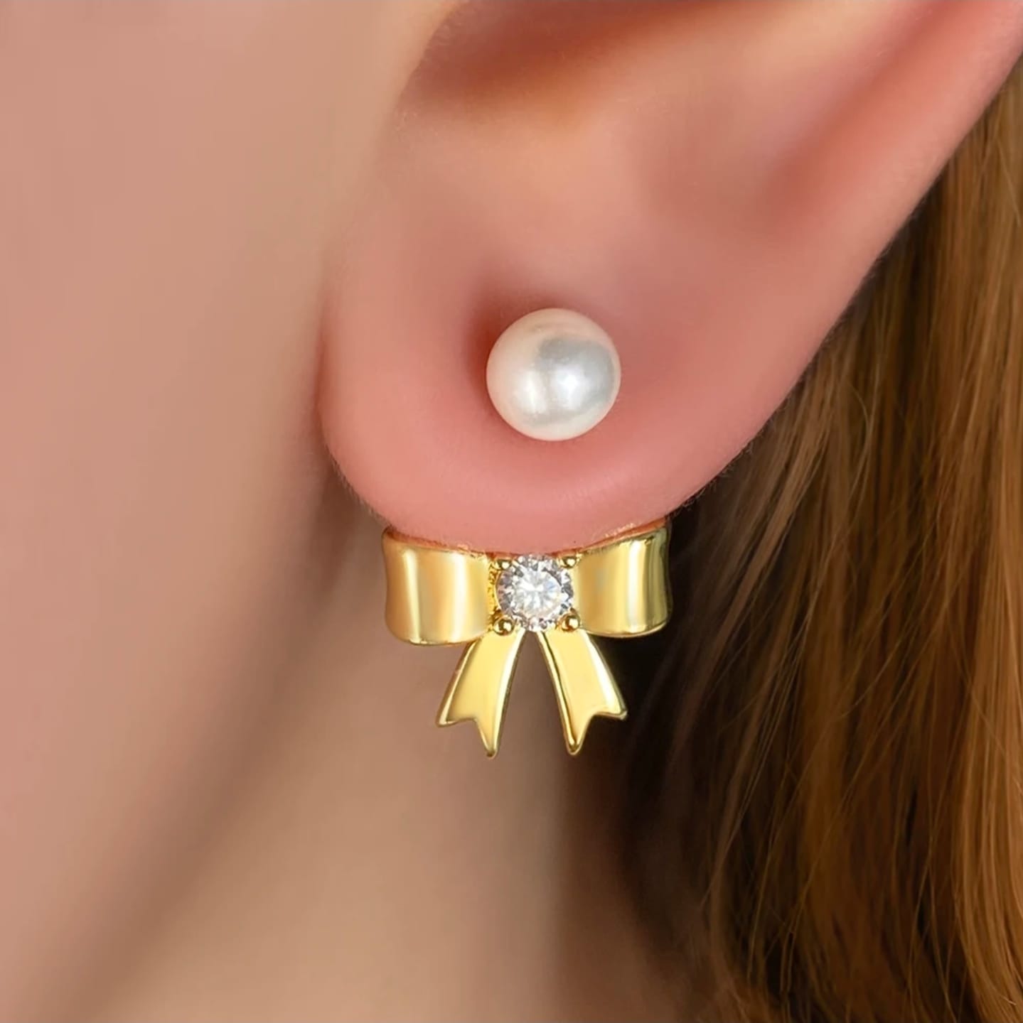 Pearl bow dangle stud earrings
