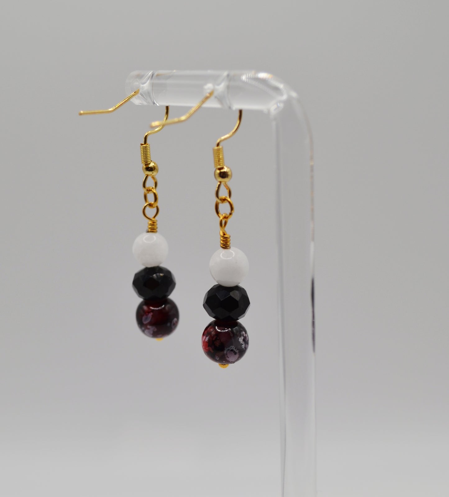 Red, black and white earrings