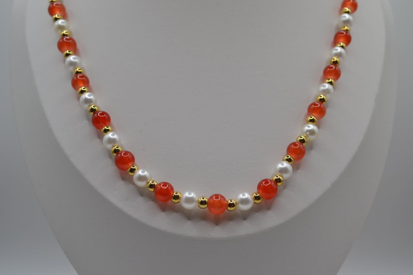 Orange, pearl and gold necklace