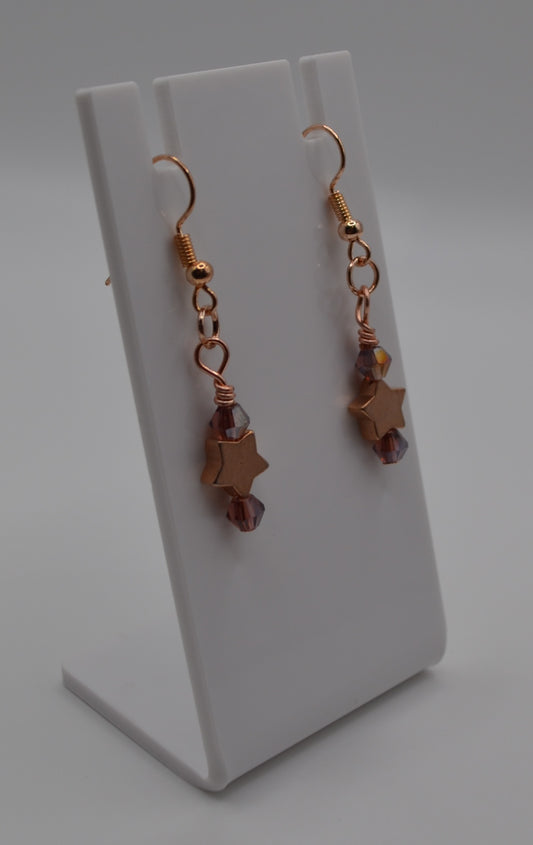 Dark purple rose gold star earrings