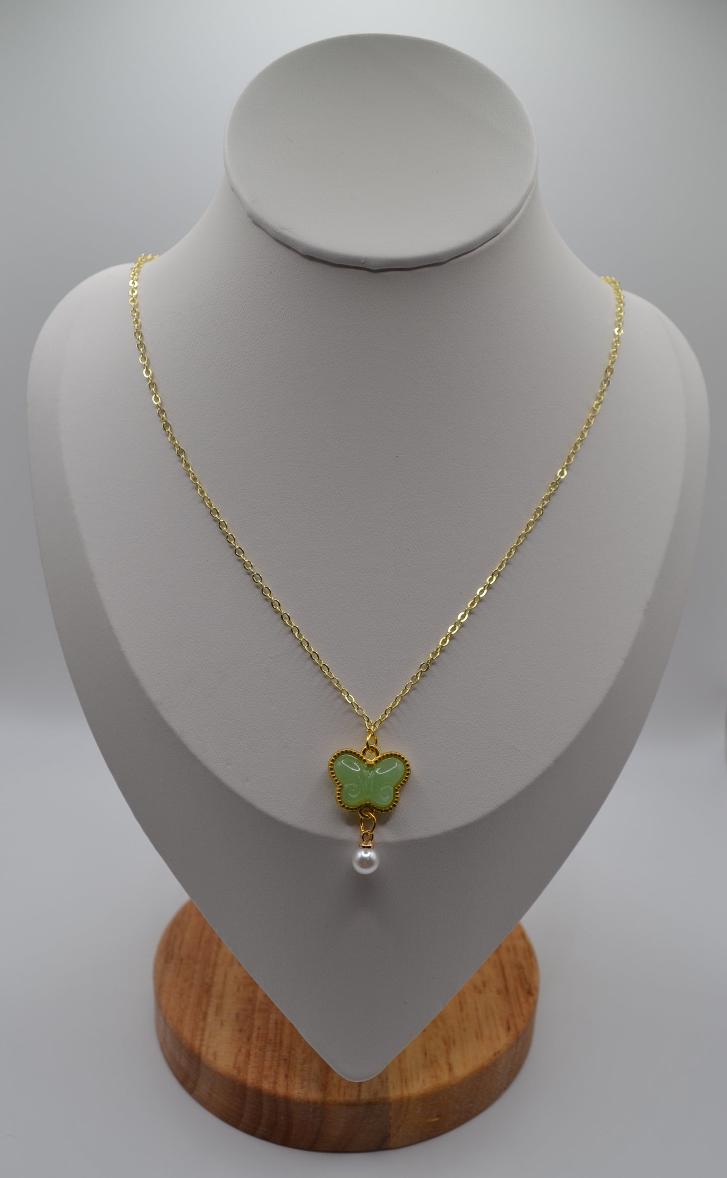 Sage green butterfly pendant necklace