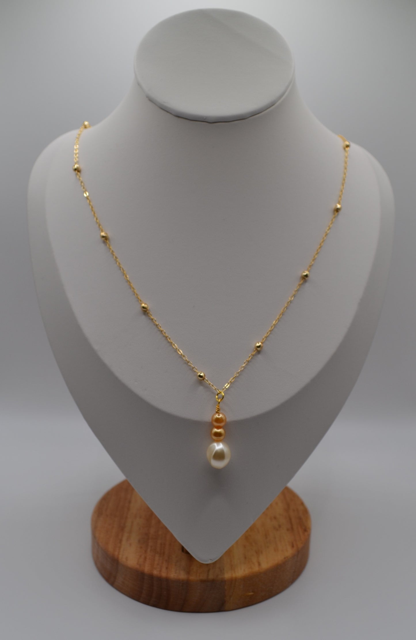 Ivory and bronze pearl gold plated necklace