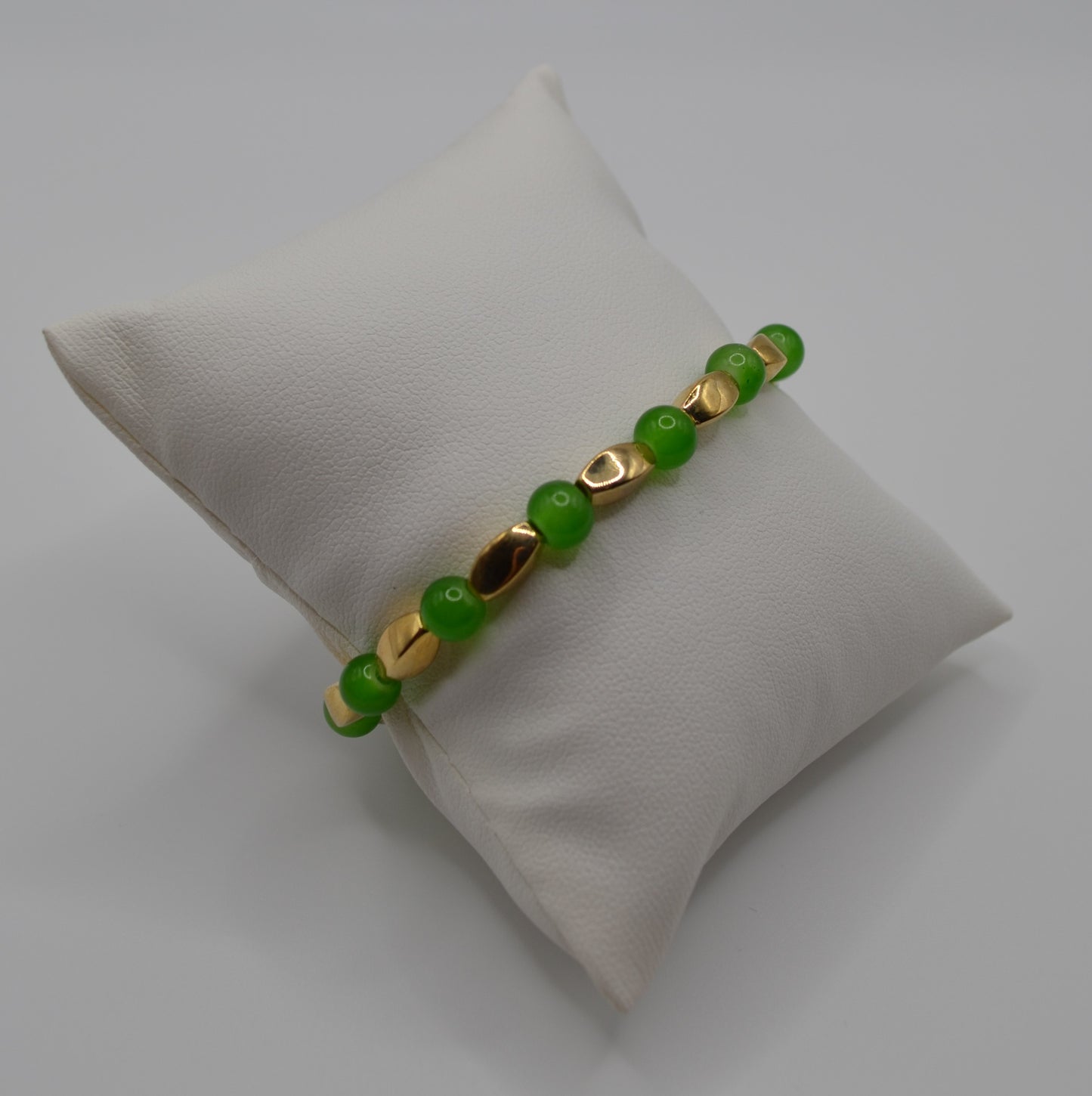 Green and gold beaded bracelet
