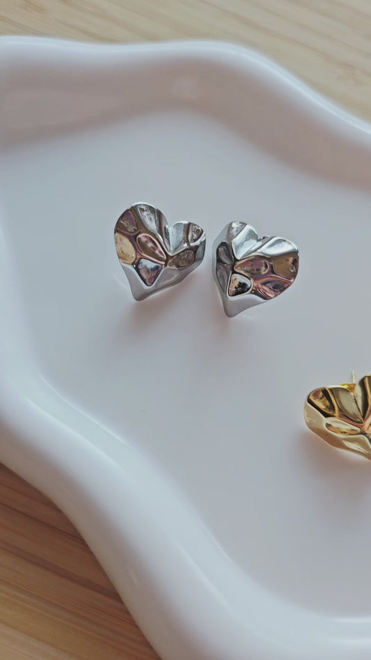 Gold and silver heart stud earrings