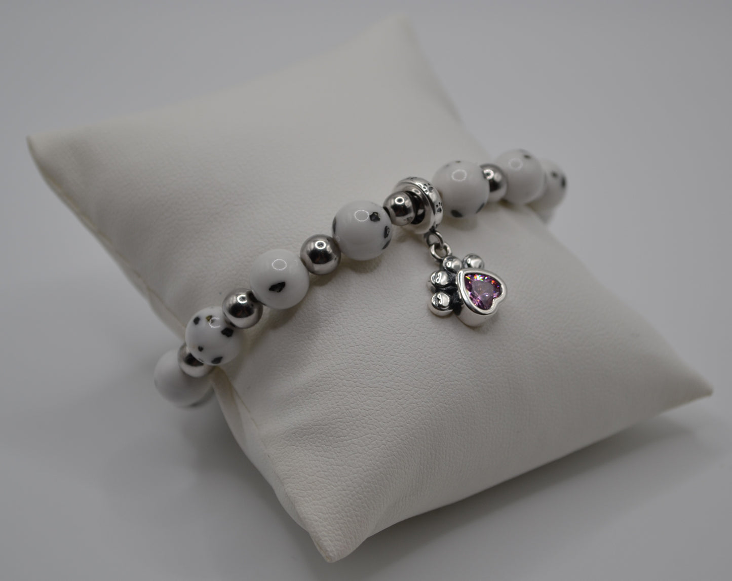 Dalmatian bracelet with pink paw charm