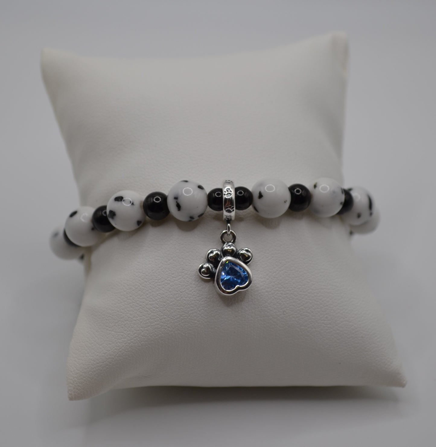 Dalmatian bracelet with blue paw charm