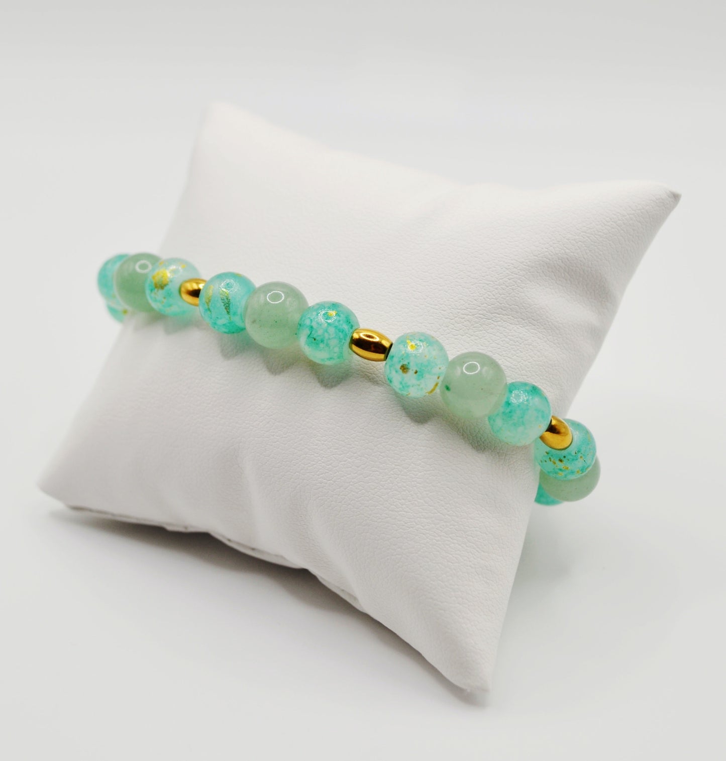 Green and gold beaded bracelet
