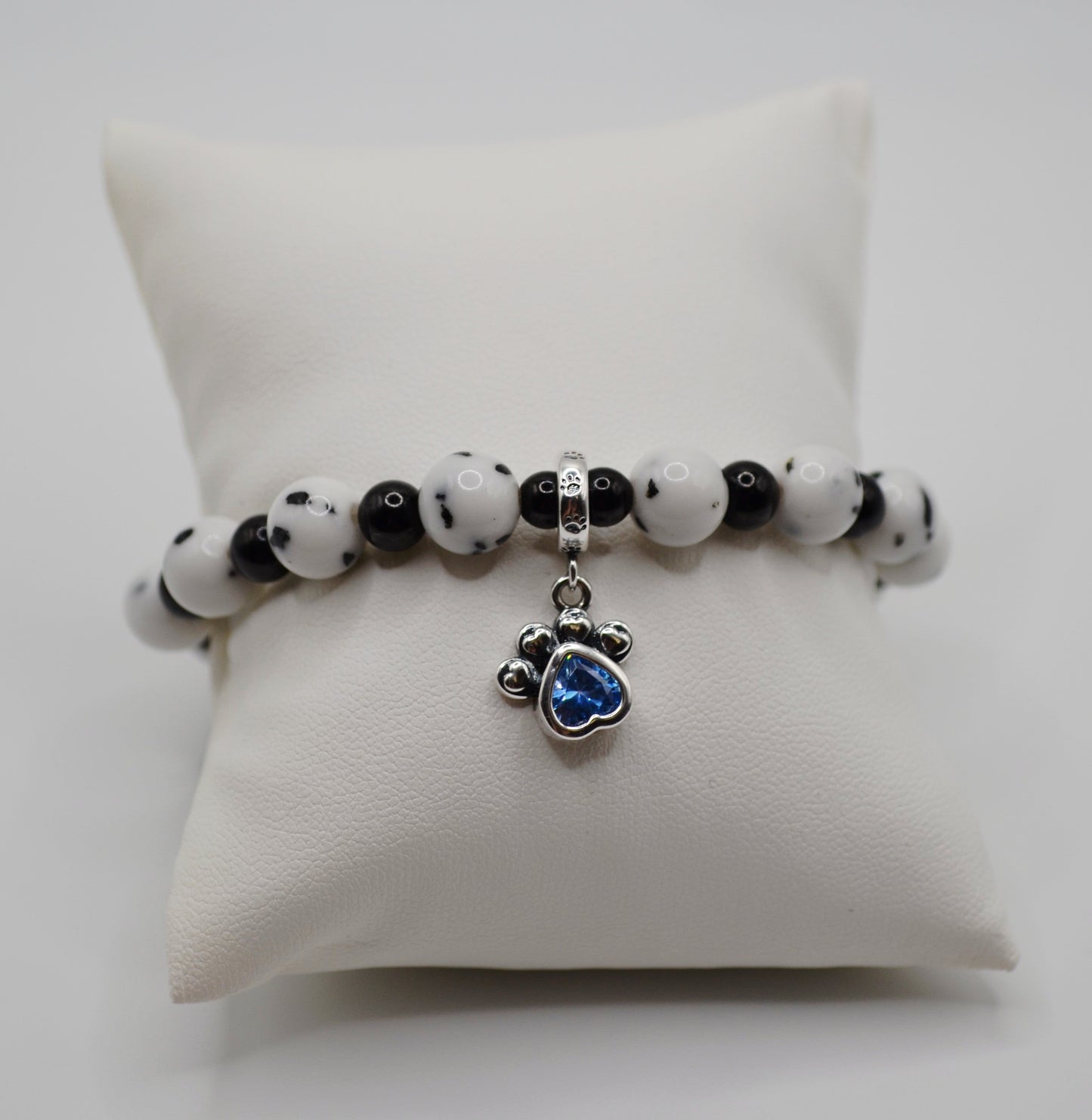 Dalmatian bracelet with blue paw charm