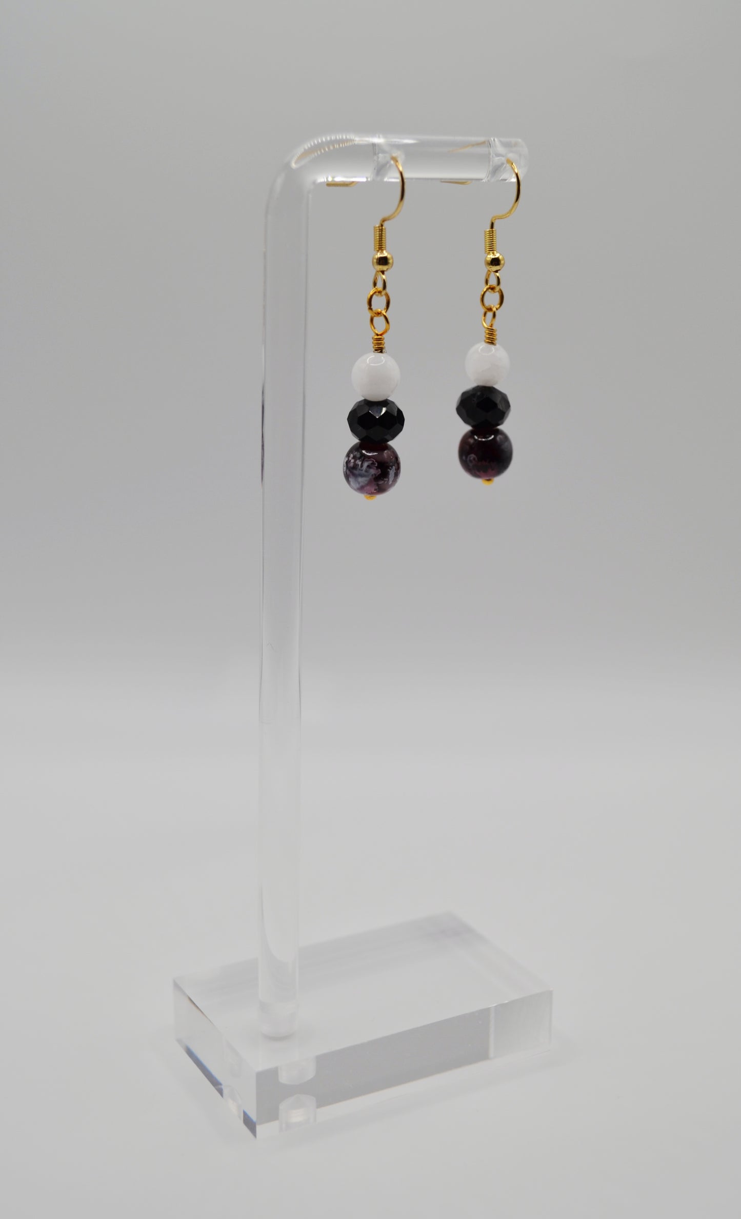 Red, black and white earrings
