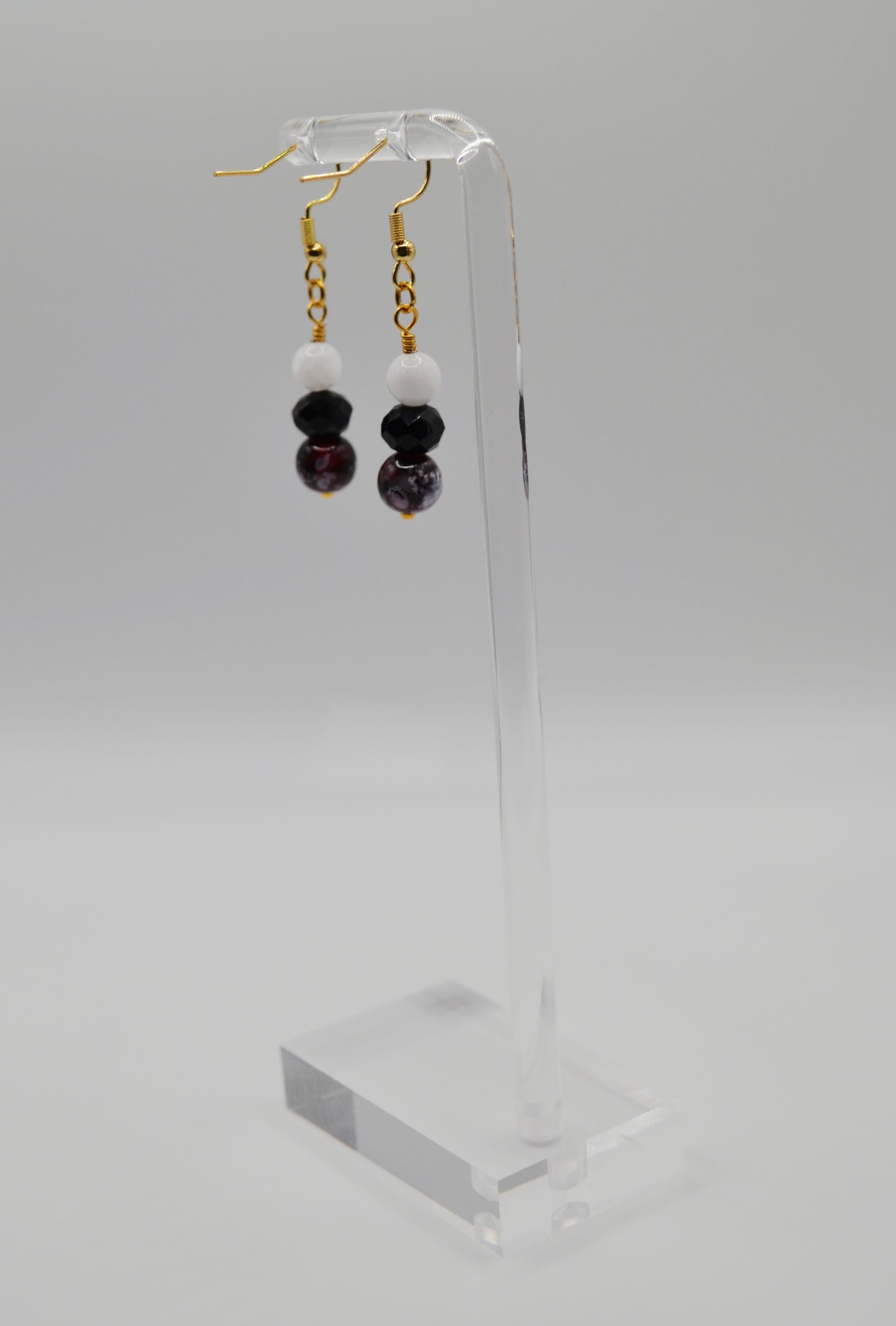 Red, black and white earrings
