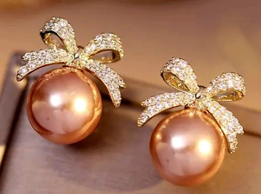 Pearl bowknot earrings