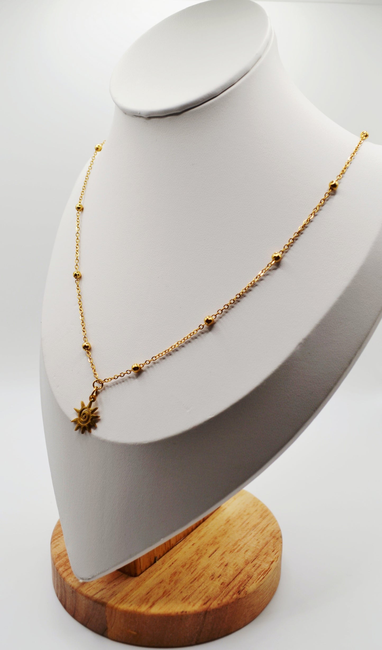 Spiral sun pendant necklaces