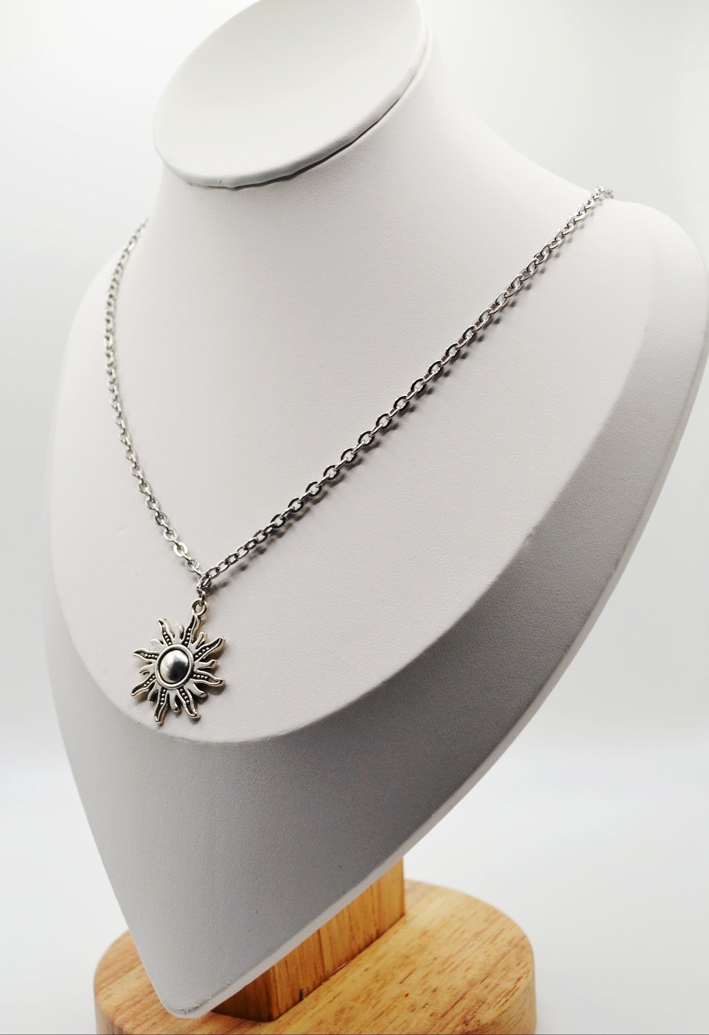 Silver sun pendant necklace
