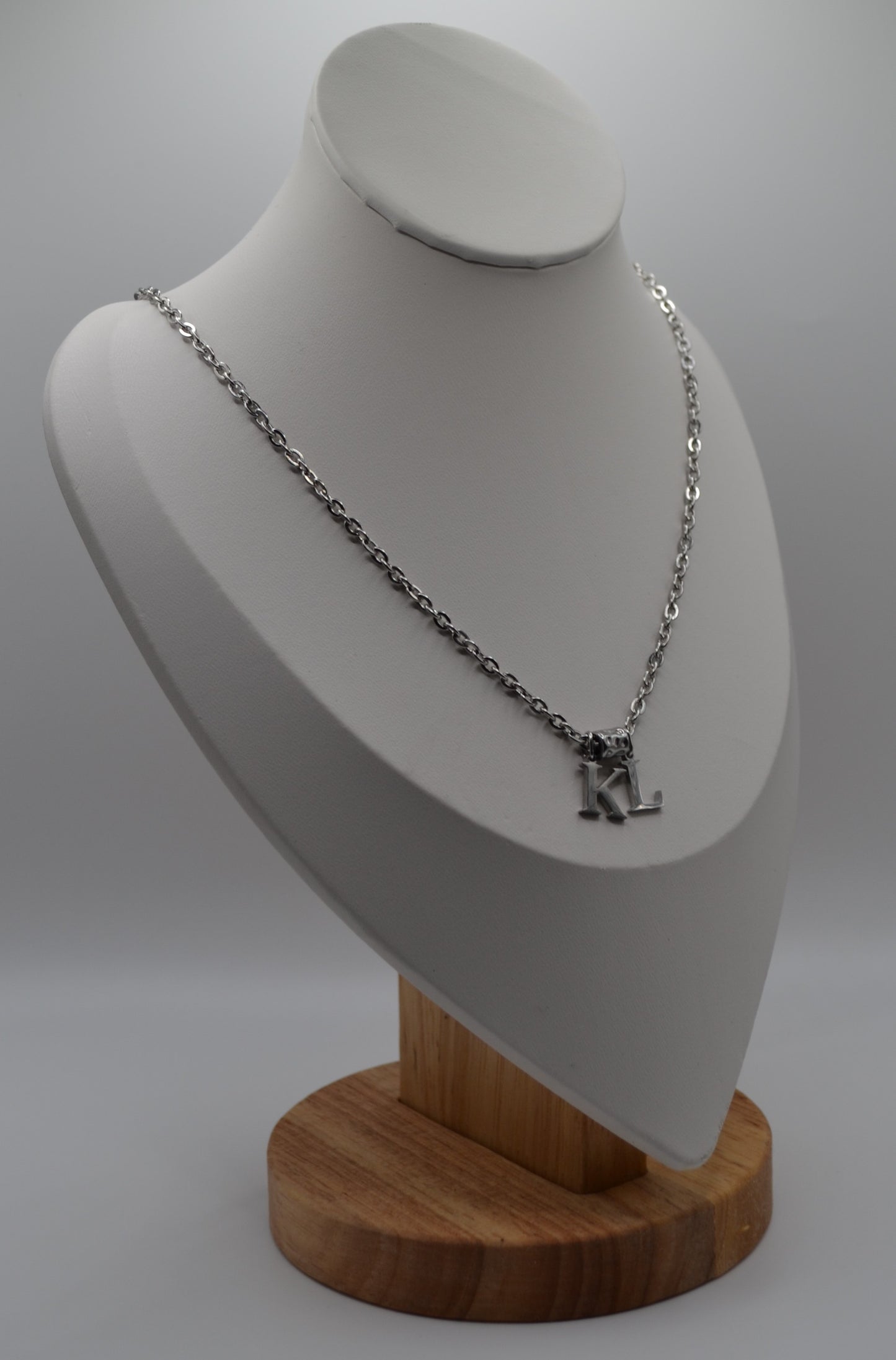 Birthstone and letter charm necklaces