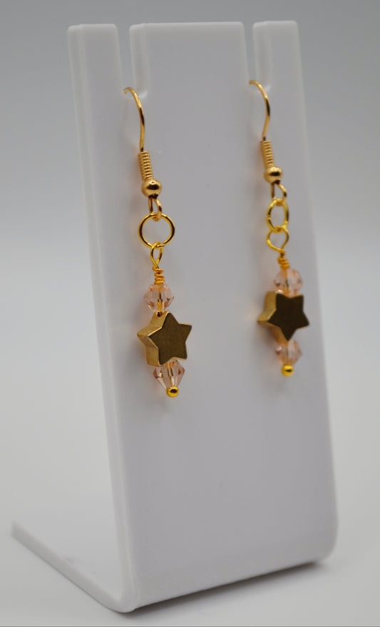 Pink gold star earrings