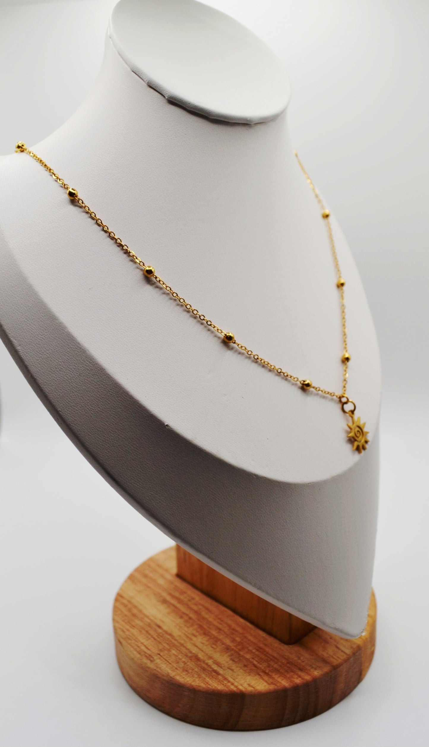 Spiral sun pendant necklaces