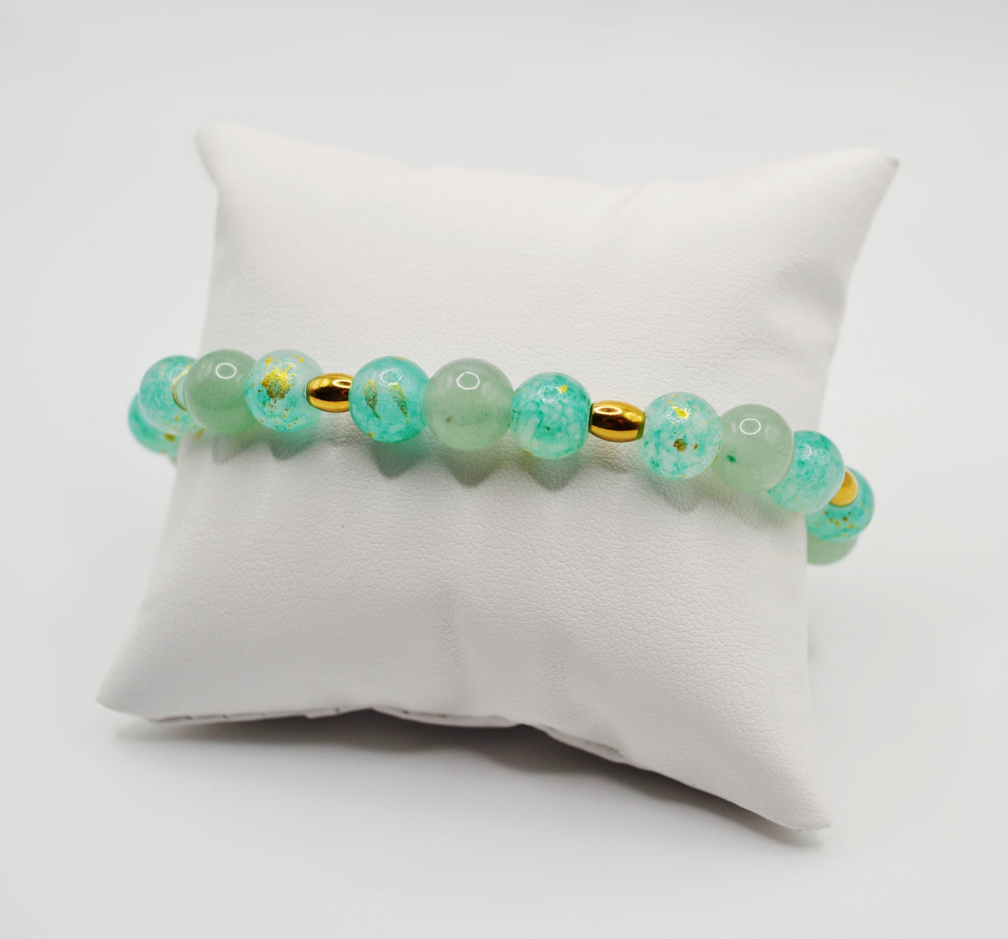 Green and gold beaded bracelet