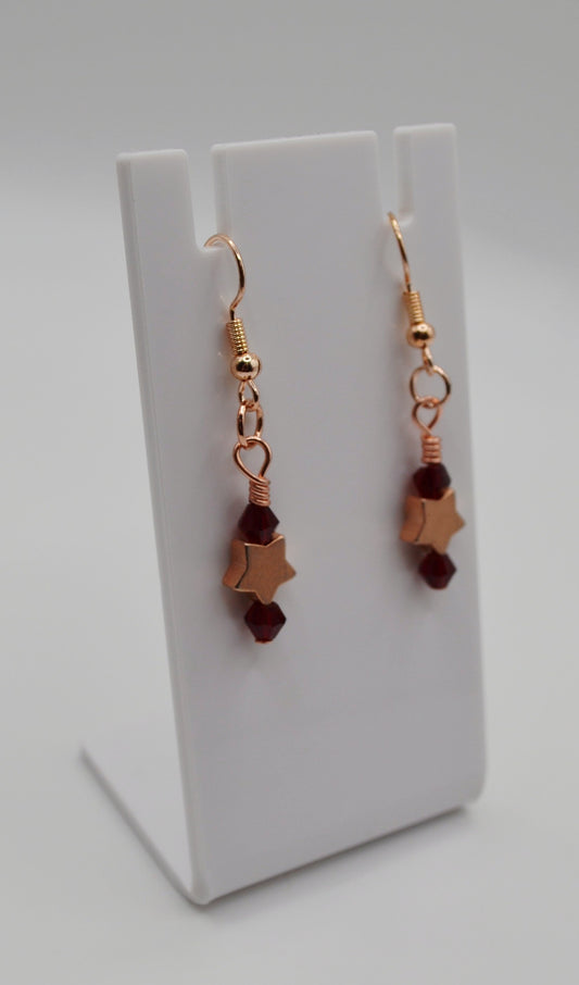 Burgundy rose gold star earrings
