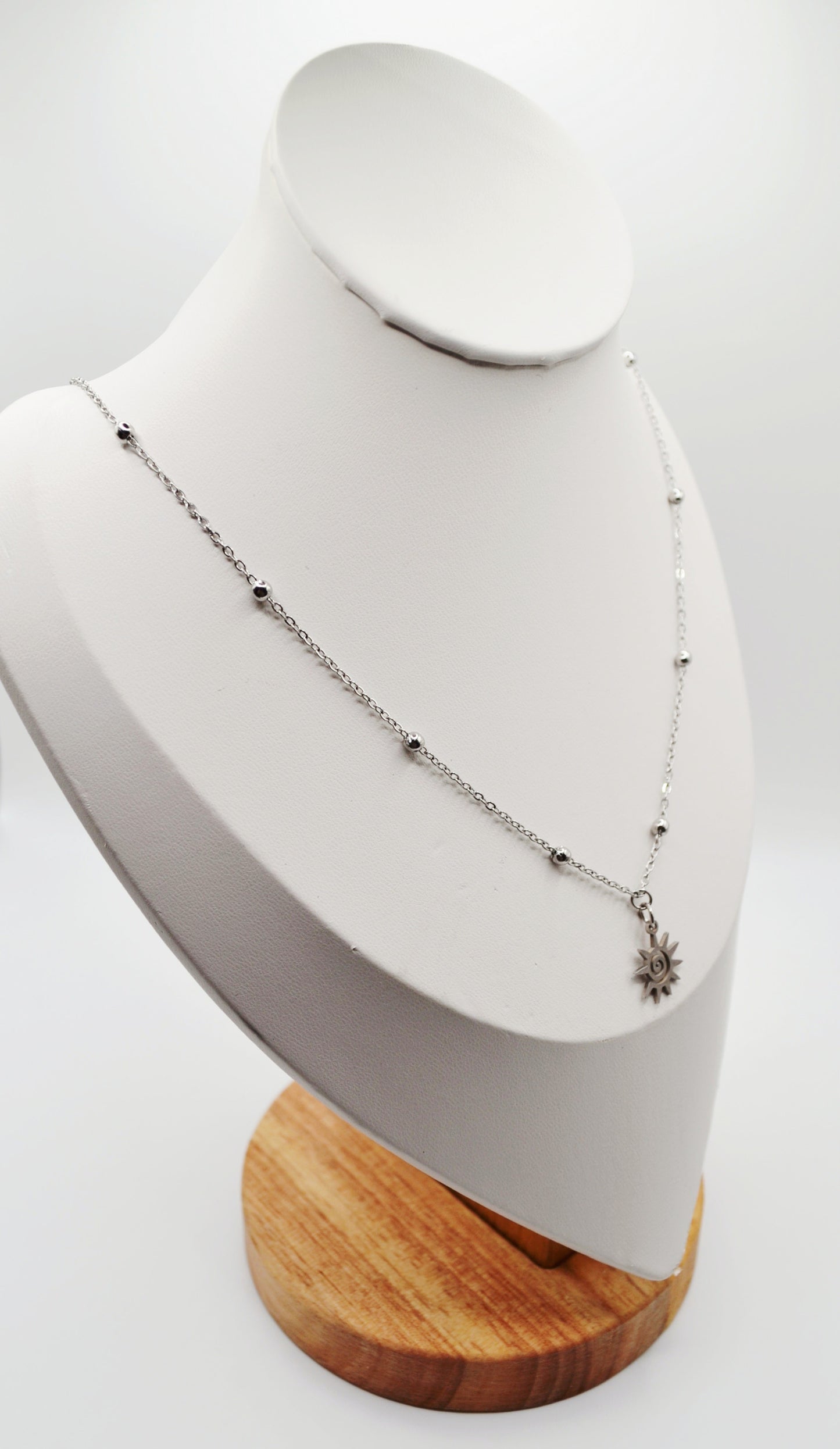 Spiral sun pendant necklaces