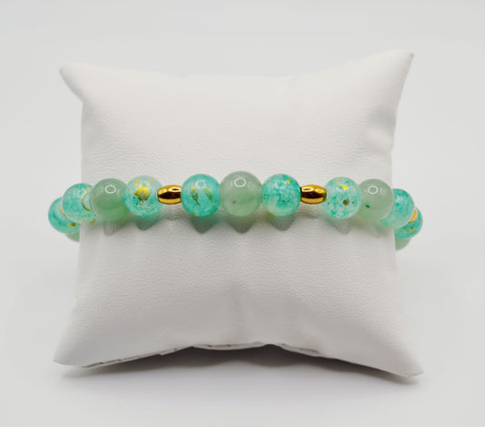 Green and gold beaded bracelet