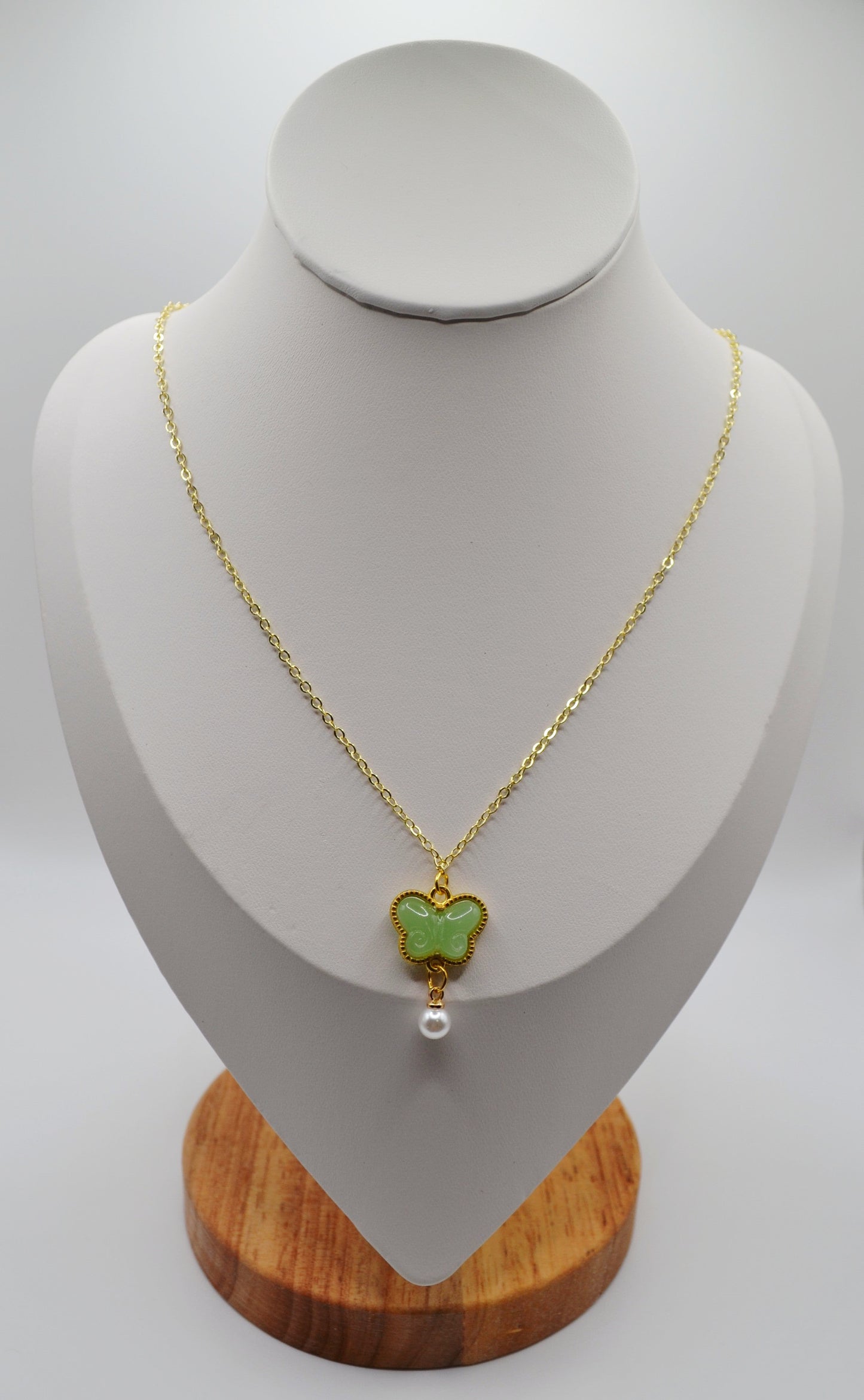 Sage green butterfly pendant necklace